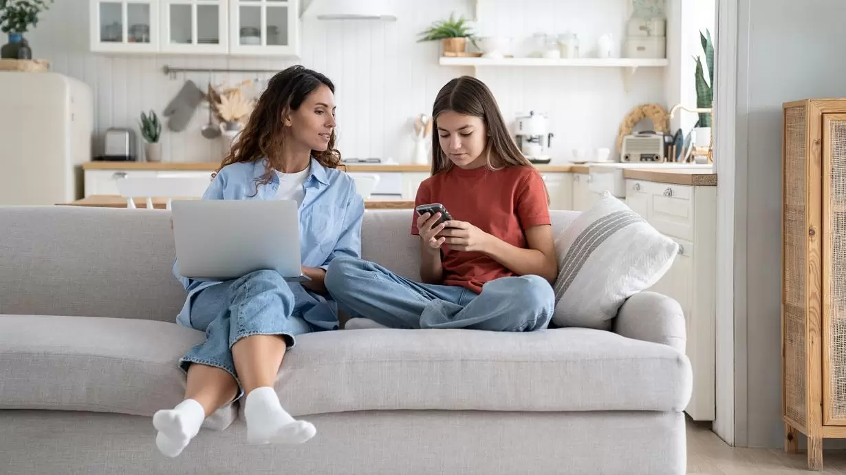 Mother And Daughter Discussing New App